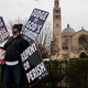 A member of the Westboro Baptist Church pickets the funeral of Antonin Scalia. Photo via Getty Images.
